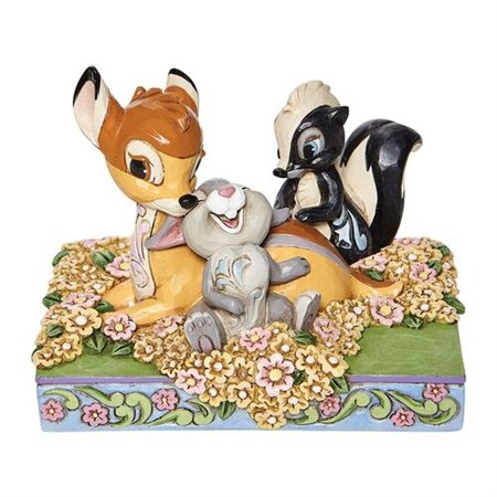 Figura enesco disney bambi e amigos entre flores