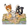 Figura enesco disney bambi e amigos entre flores